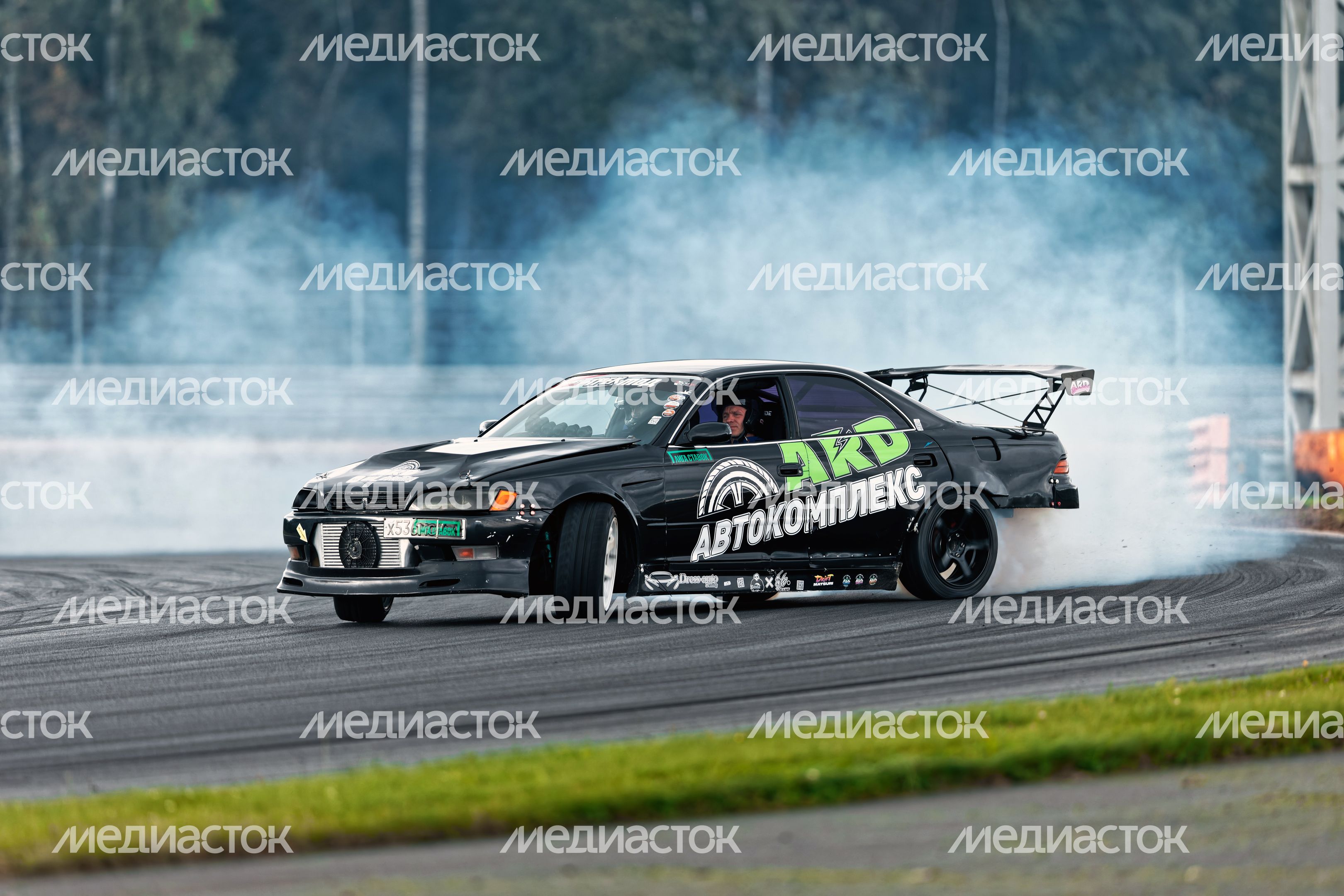 Дрифт-гонка автомобилей по автодрому Moscow Raceway на фестивале «Дрифт Экспо» в Волоколамске Дрифт-гонка автомобилей по автодрому Moscow Raceway на фестивале «Дрифт Экспо» в Волоколамске
