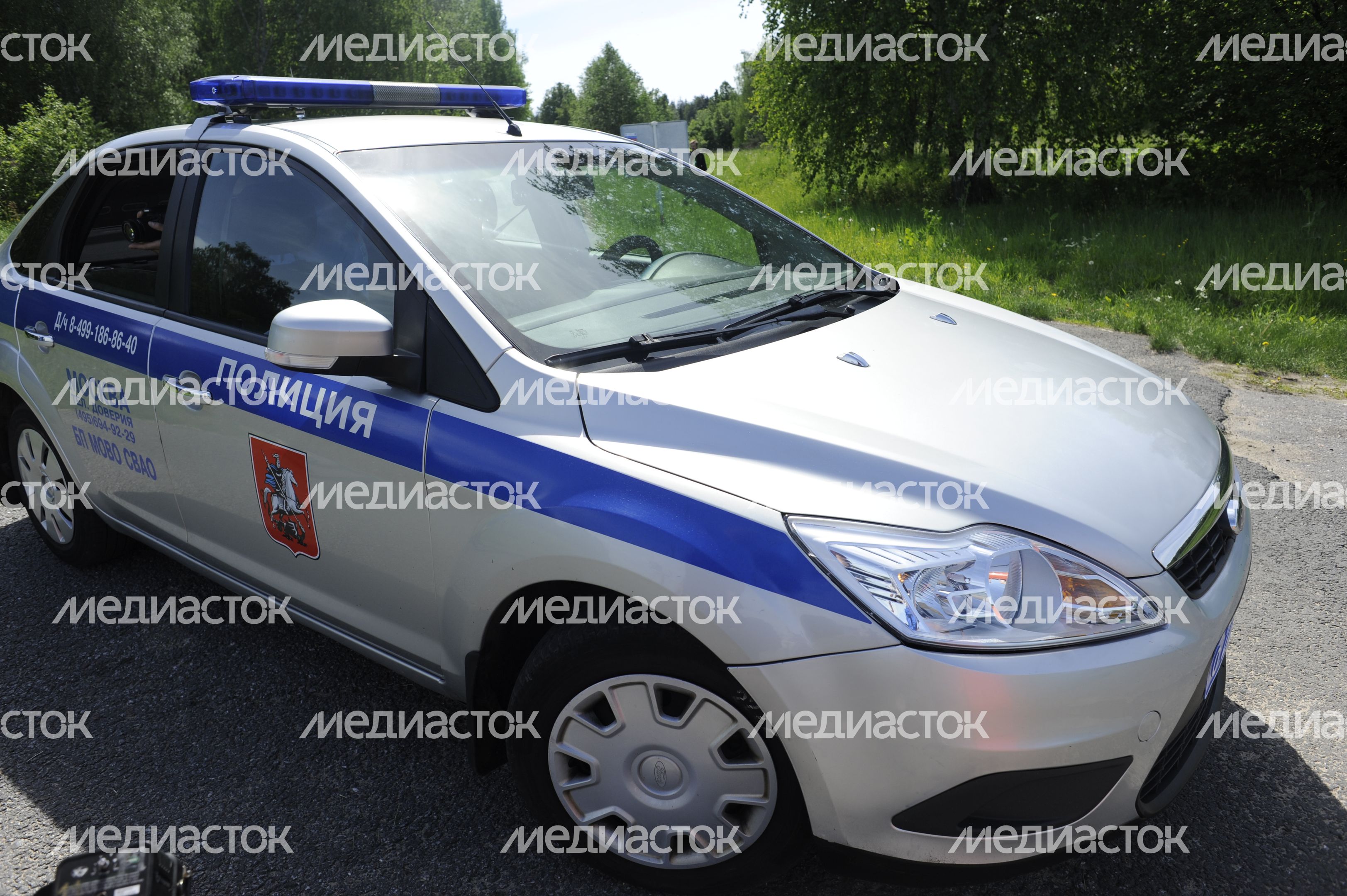 Полицейская машина в поселке Акулово