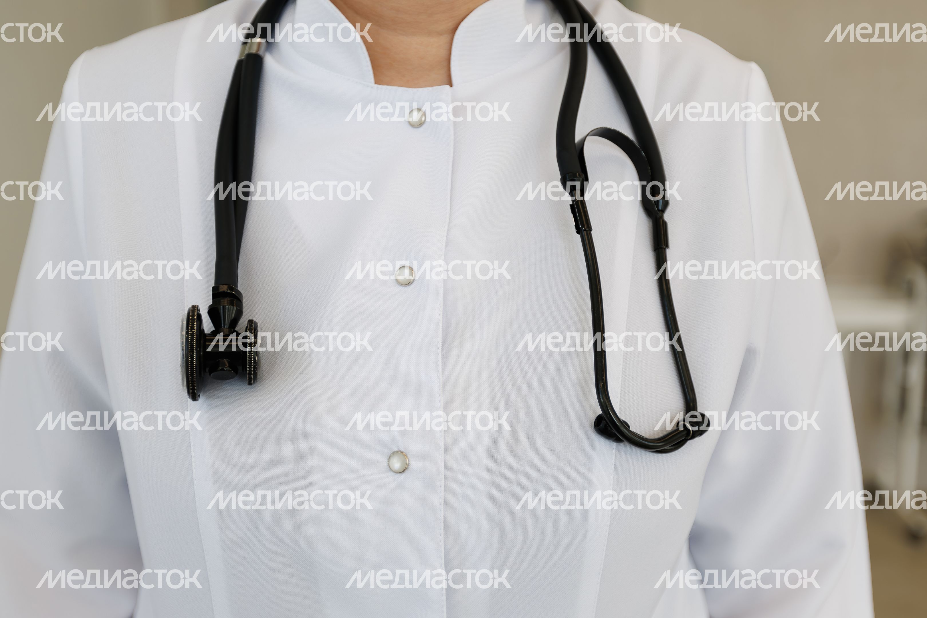 Врач в белом халате Врач в белом халате