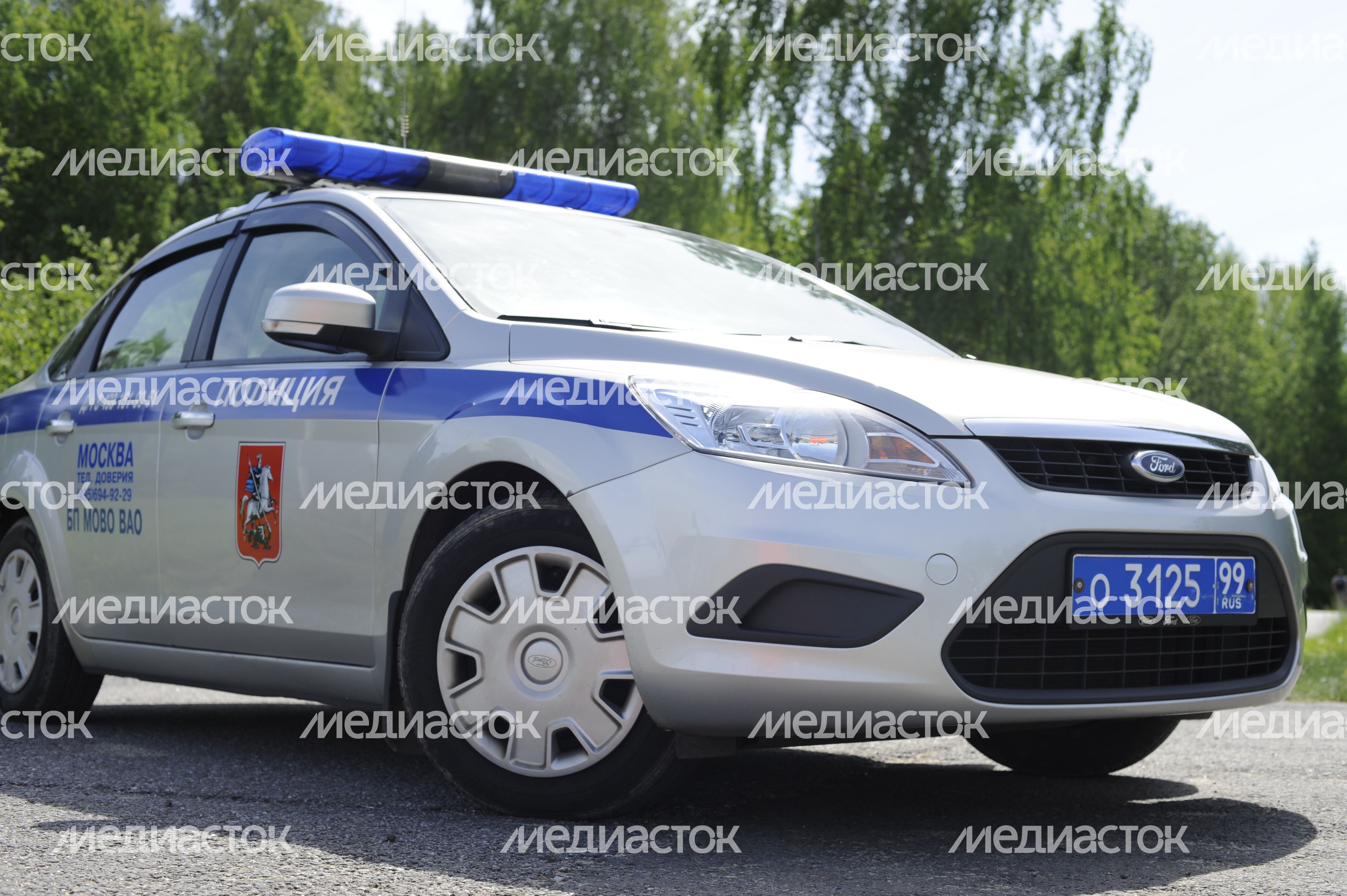 Полицейская машина в поселке Акулово