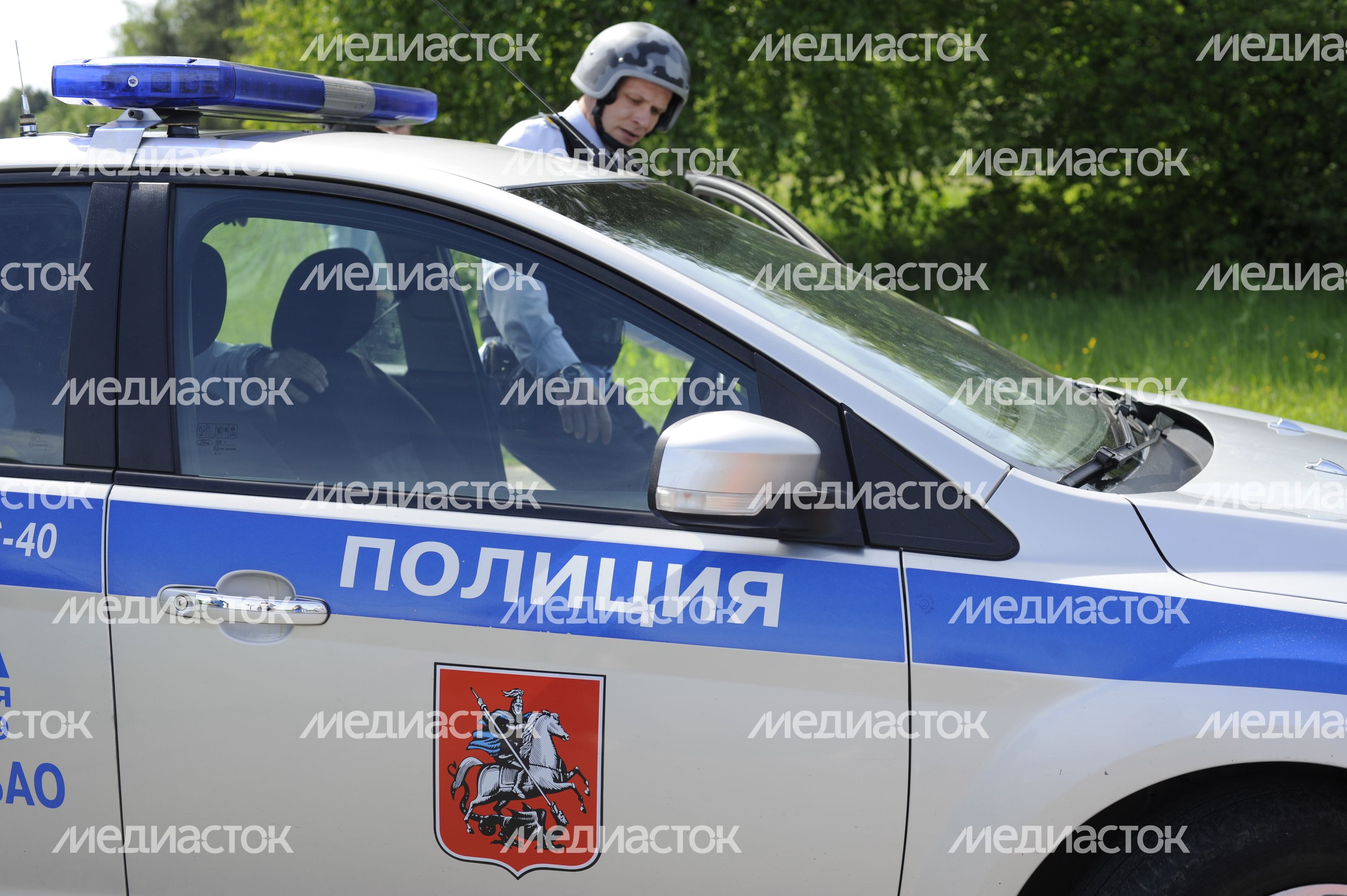 Полицейская машина в поселке Акулово