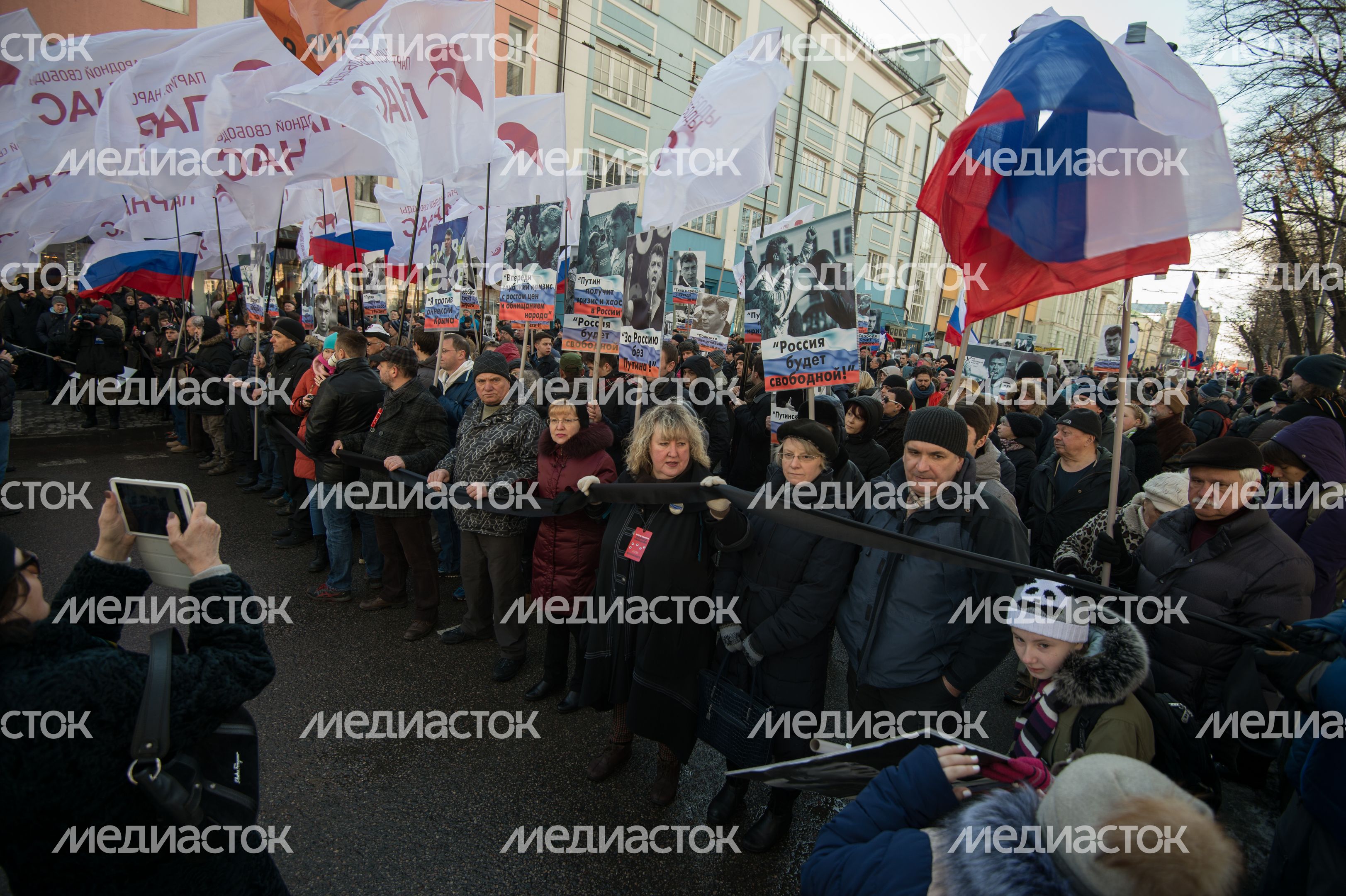 Марш памяти убитого политика Бориса Немцова в Москве Марш памяти убитого политика Бориса Немцова в Москве