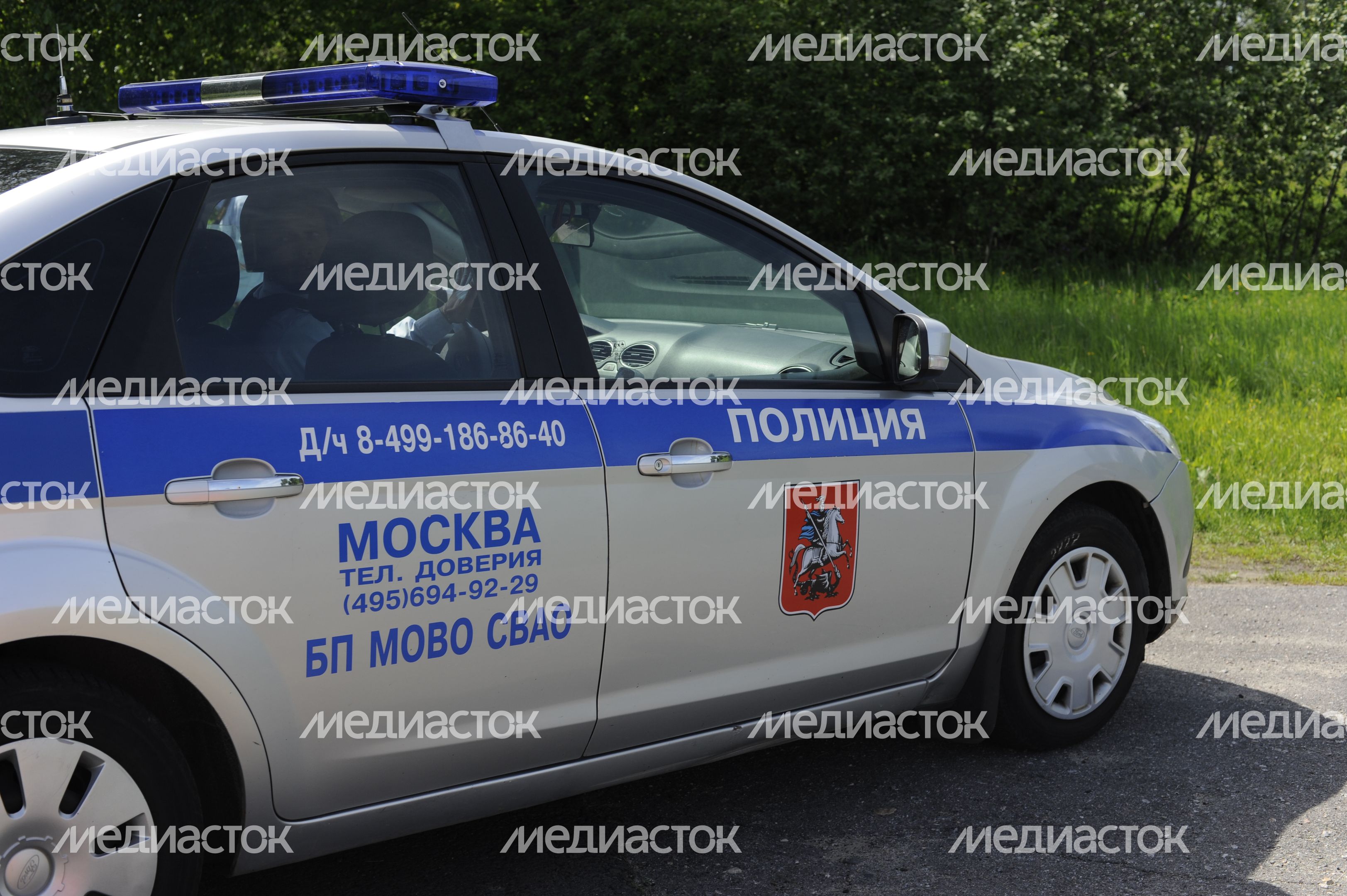 Полицейская машина в поселке Акулово