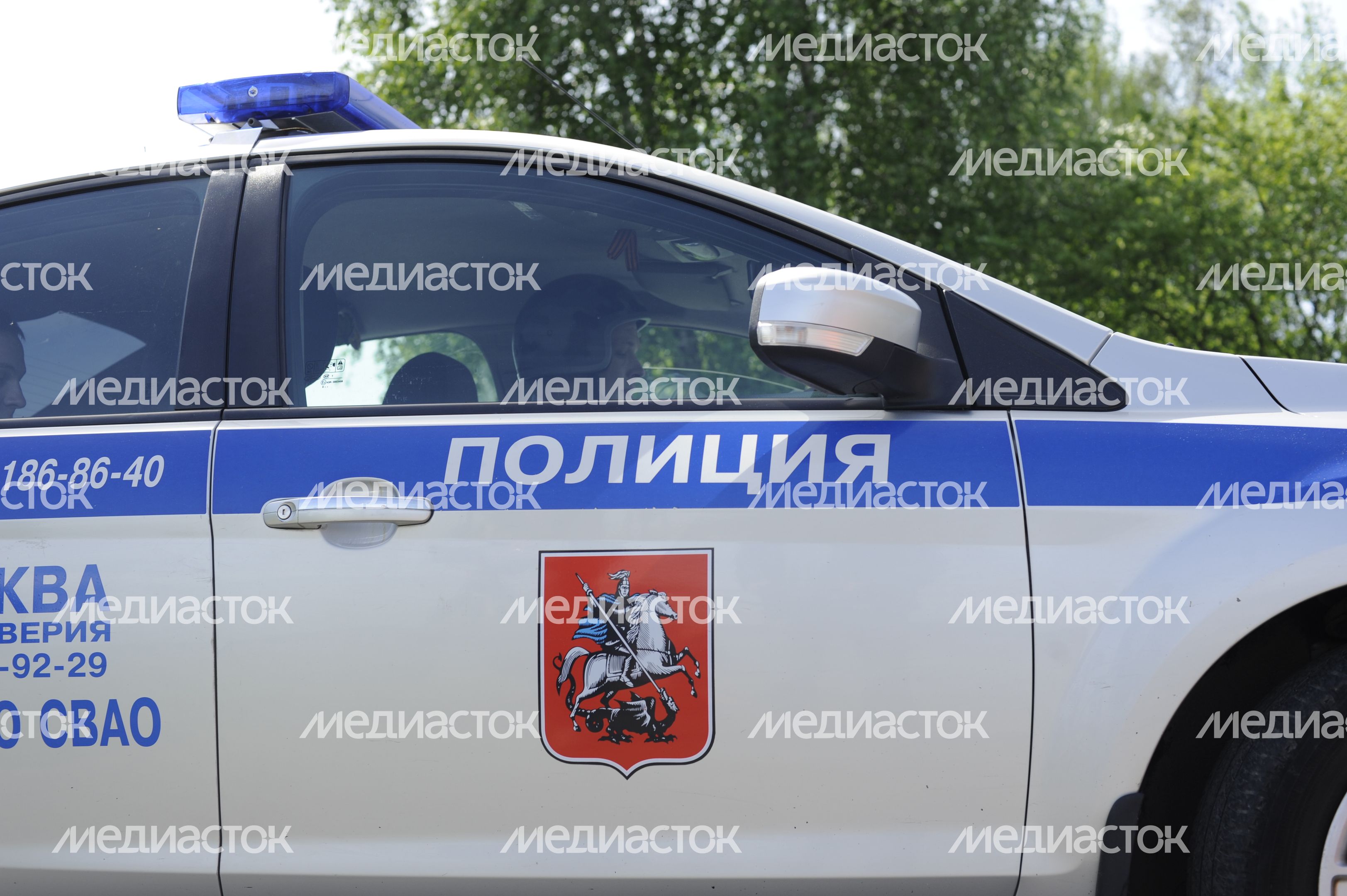 Полицейская машина в поселке Акулово