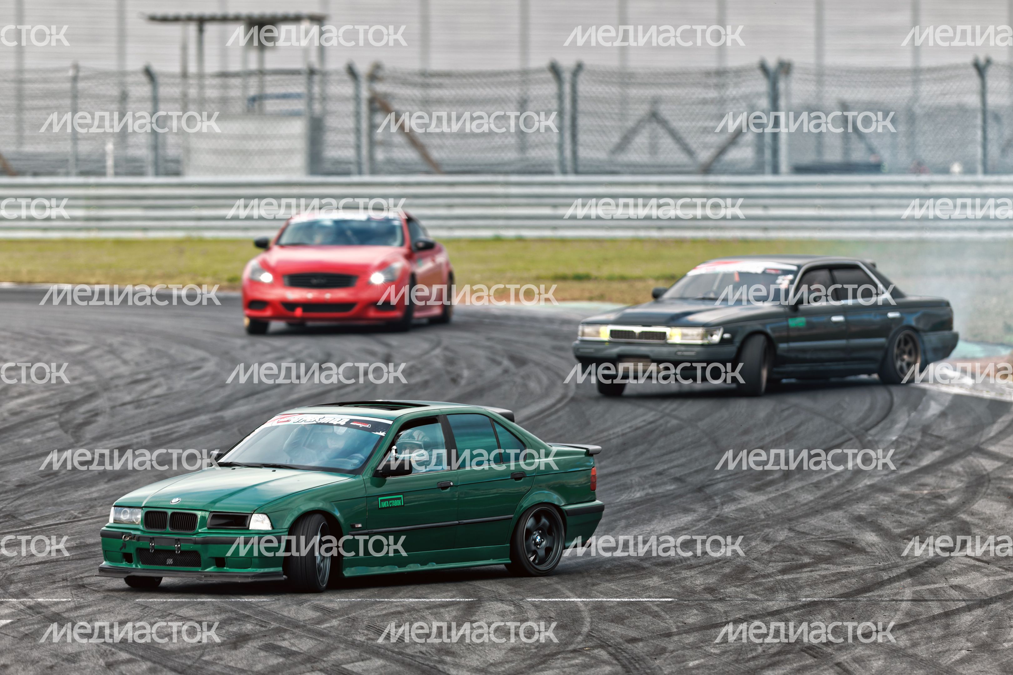 Дрифт-гонка автомобилей по автодрому Moscow Raceway на фестивале «Дрифт Экспо» в Волоколамске Дрифт-гонка автомобилей по автодрому Moscow Raceway на фестивале «Дрифт Экспо» в Волоколамске