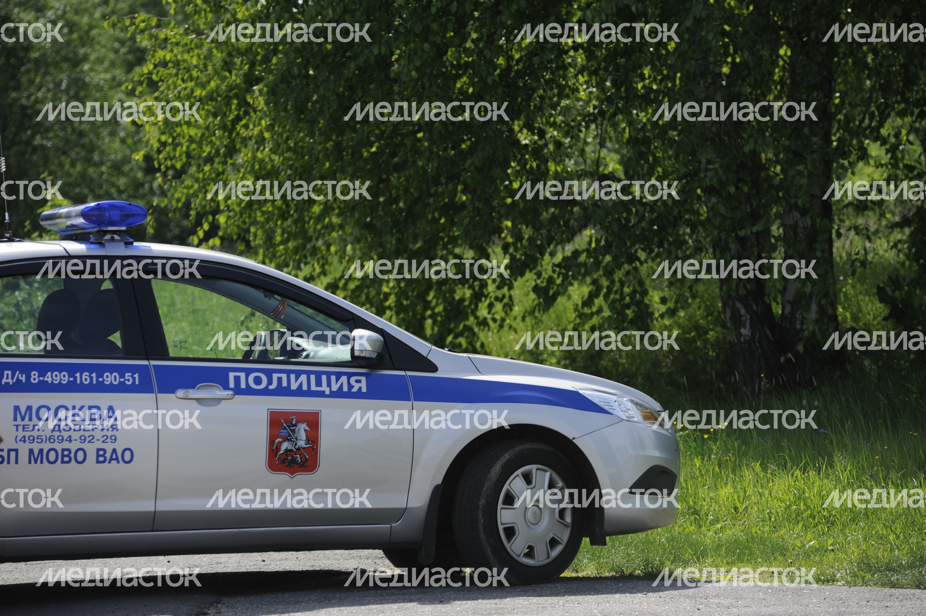 Полицейская машина в поселке Акулово